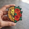 Lion and Roses Split Design Tattoo Style Iron On Embroidered Patch — Iron-on patch