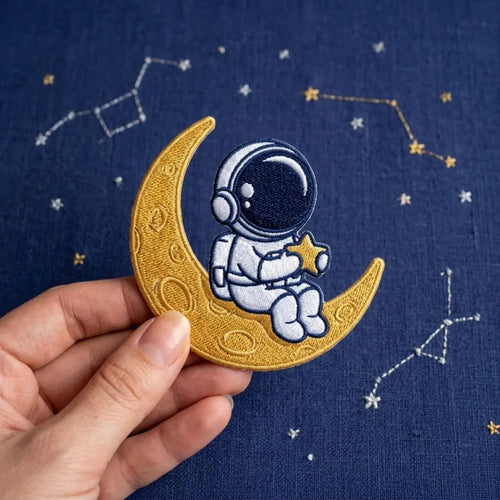 Astronaut Sitting on Crescent Moon Holding Star Space Iron On Embroidered Patch — Iron-on patch