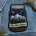 Mason Jar Mountain Scene Keep What Matters Nature Iron On Embroidered Patch — Iron-on patch