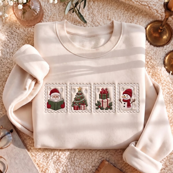 Christmas Stamp Santa Reading Book Snowman Tree Gifts Holiday embroidered sweatshirt — front view