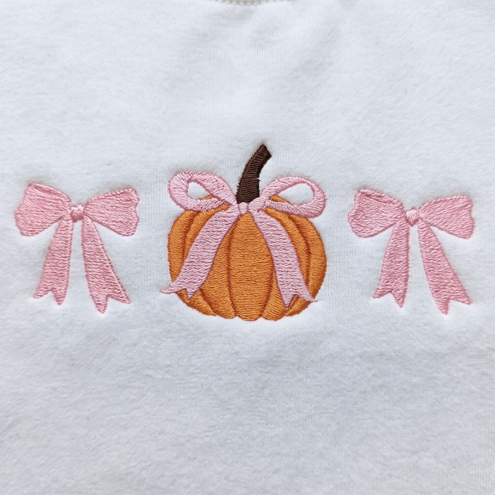 Personalized Fall Pumpkin Pink Coquette Bows Minimalist embroidered sweatshirt — front view