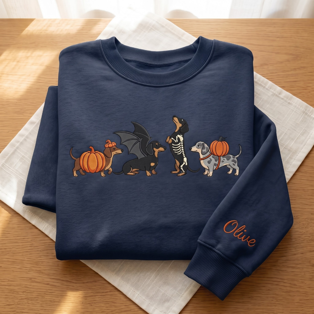Personalized Halloween Dachshund Costumes Pumpkin Bat Wings Skeleton embroidered sweatshirt — front view